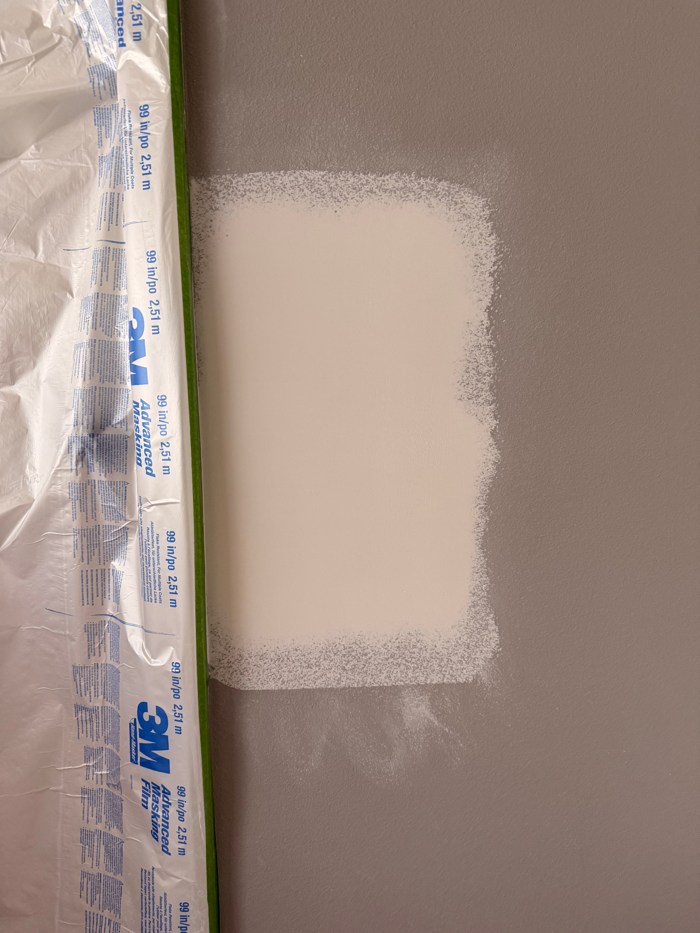 Patch sanded smooth and primed white, masked off and ready for texture spray