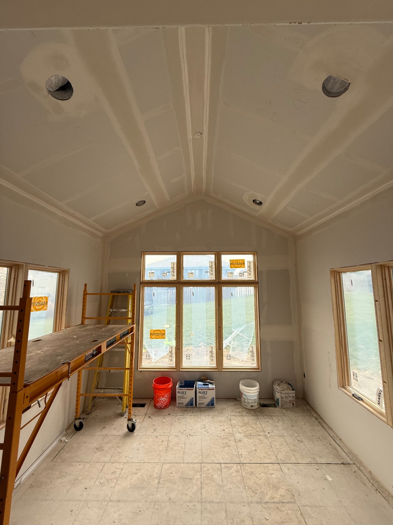 Gable wall and ceiling fully coated and sanded smooth, paint-ready