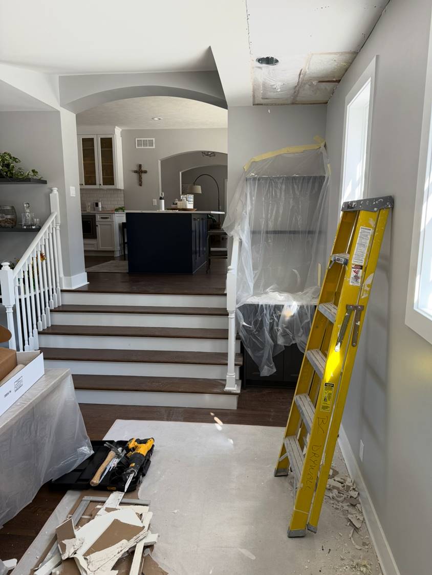 Ceiling cut open above a leak — prepped for new board and finish