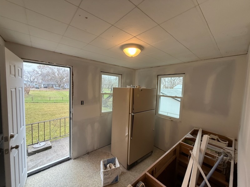 Small back-room remodel with new drywall around the kitchenette